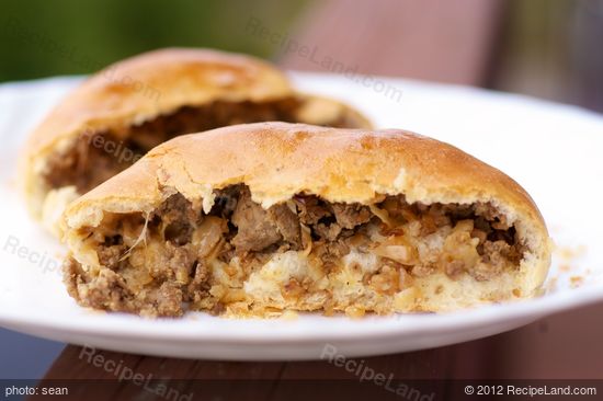 Brush buns with melted butter and serve warm.