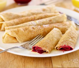 Raspberry Crepes with Creamy Orange Syrup