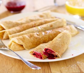 Raspberry Crepes with Creamy Orange Syrup