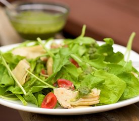 Arugula, Artichoke and Cherry Tomato  Salad with Pesto Vinaigrette