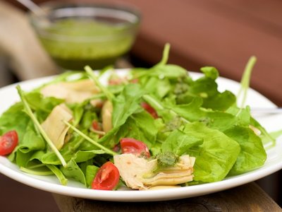 Arugula, Artichoke and Cherry Tomato  Salad with Pesto Vinaigrette