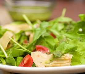 Arugula, Artichoke and Cherry Tomato  Salad with Pesto Vinaigrette