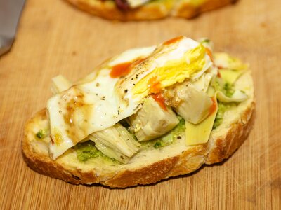 Artichoke Hearts, Basil Pesto and Fried Egg Crostini 