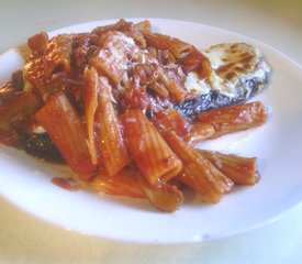 Rigatoni Pasta Over Eggplant Parmesan