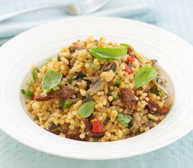 Israeli Couscous with Sauteed Mushrooms, Pine Nuts and Sun-Dried Tomatoes 