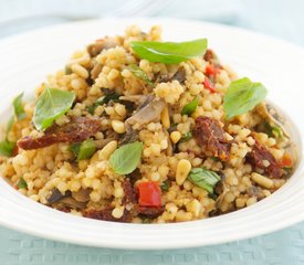 Israeli Couscous with Sauteed Mushrooms, Pine Nuts and Sun-Dried Tomatoes 