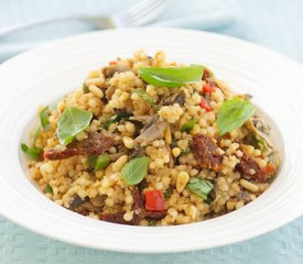 Israeli Couscous with Sauteed Mushrooms, Pine Nuts and Sun-Dried Tomatoes 