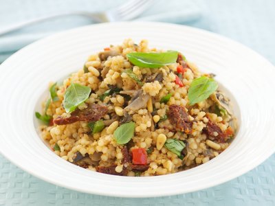 Israeli Couscous with Sauteed Mushrooms, Pine Nuts and Sun-Dried Tomatoes 