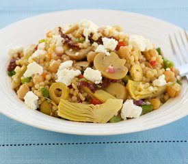 Chickpea, Marinated Artichoke Hearts, Mushrooms, and Sun-Dried Tomato Couscous Salad with Feta