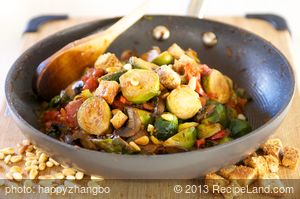 Tomato Braised Brussel Sprouts with Pine Nuts and Croutons
