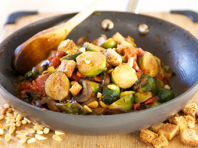 Tomato Braised Brussel Sprouts with Pine Nuts and Croutons