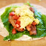 Finally place cooked eggs over bacon.