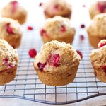 Cranberry muffins cooling on a wire rack