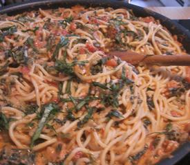 Pasta with Spinach and Tomato Cream Sauce