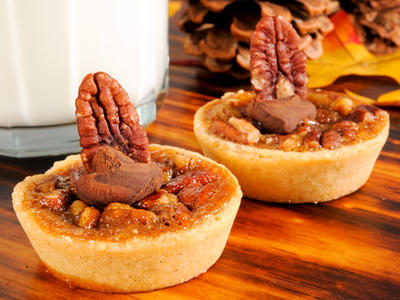 Pecan Tarts with Caramel Sauce