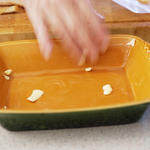 Buttered (greased) casserole dish