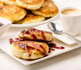 Cheescake Pancakes with Berry-Lemon Syrup