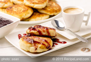 Cheescake Pancakes with Berry-Lemon Syrup