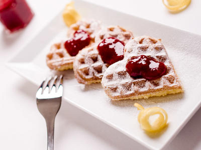 Buttermilk Waffles with Cherry-Almond Sauce