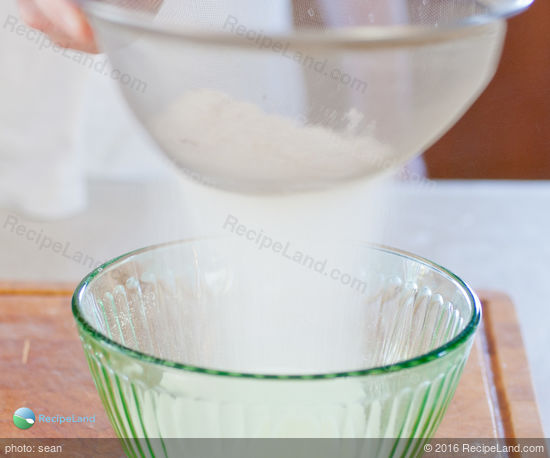 Sifting flour, salt and nutmeg