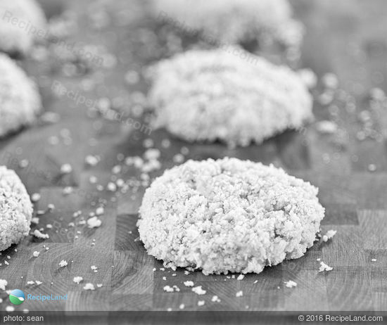 Panko breadcrumbs coating the salmon cakes, ready to cook