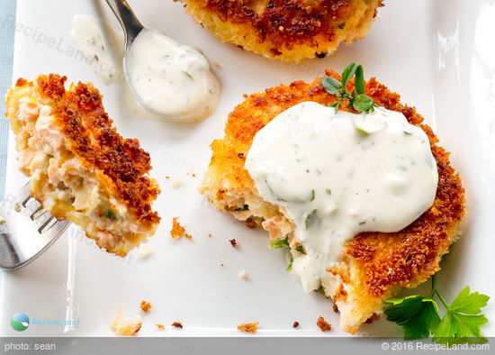 Salmon cake with dipping sauce, serving suggestion