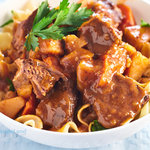 An easy crock pot beef stew recipe. This beef stew with tomato soup, potatoes, and carrots provides plenty of sauce. Perfect for serving with egg noodles, rice or crusty bread.