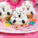 hese little sheep cupcakes are very easy to make and they look so cute, coated with white frosting and marshmallows, using Jelly beans as feet and ears, everyone loves these little sheep!