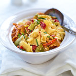 Easy Tortellini pasta salad with sundried tomatoes and artichokes.