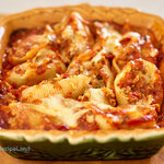 Beef stuffed inside large pasta shells topped with gooey cheese then baked to perfection. Make-ahead and it's freezer friendly.