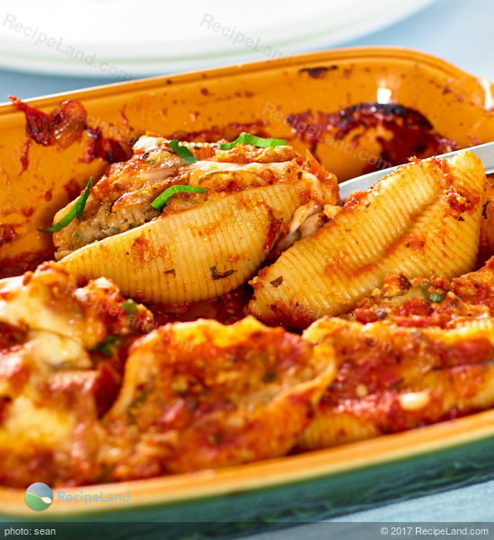 Beef stuffed inside large pasta shells topped with gooey cheese then baked to perfection. Make-ahead and it's freezer friendly.