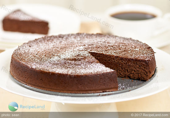 Gluten-free Chocolate Mousse Passover Cake with a slice removed