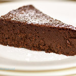 This flourless chocolate mocha cake is moist, rich and super chocolaty. You won't believe it's flour-less, so your gluten-free friends or family can all enjoy one or two slices of this decadent cake.