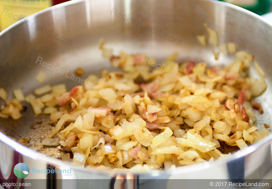 Onions and bacon in a saucier pan
