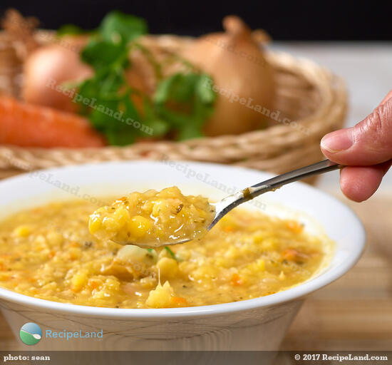 Close-up of a spoonful of yellow-split pea soup