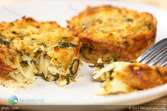 Close-up of basil potato latkes showing the crispy latkes, with moist interior