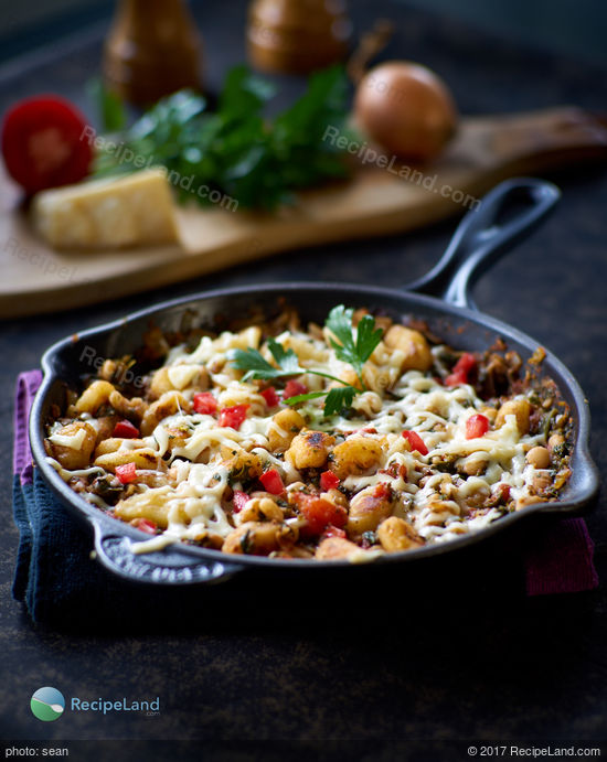 Italian gnocchi with spinach and white beans topped with melted mozzarella and Parmesan. Comes together quickly and hits all the right notes. An easy and delicious vegetarian dinner to make for your family.