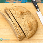 A rustic whole-grain free-form loaf barley bread recipe. Wonderfully rich and complex flavors with a hearty texture that's great when toasted and spread with your favorite toast topper.