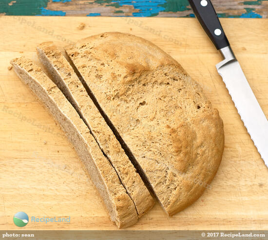 A rustic whole-grain free-form loaf barley bread recipe. Wonderfully rich and complex flavors with a hearty texture that's great when toasted and spread with your favorite toast topper.
