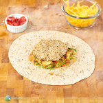 Skip the fast food queue - it's easy to make your own breakfast wraps at home. Crispy home fried potatoes, egg, cheese and a sausage patty wrapped up in a crispy tortilla.