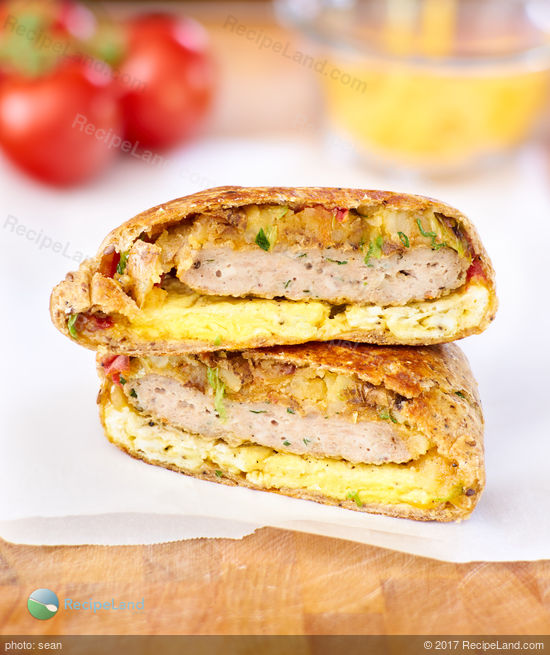 Skip the fast food queue - it’s easy to make your own breakfast wraps at home. Crispy home fried potatoes, egg, cheese and a sausage patty wrapped up in a crispy tortilla.