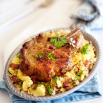 Baked pork chops with bacon and egg fried rice. Browned on the stovetop and finished in the oven for tender pork.