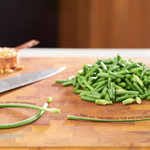 Garlic scapes lift this white dip into a seasonal, delicious and healthy beginning of summer snack. 