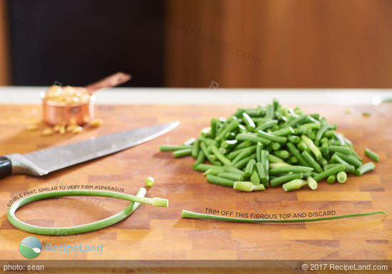 Turn garlic scapes into fluffy, cheesy buttermilk biscuits.  The garlic scapes add a fresh mild hint of garlic to the savory biscuits which is perfectly complimentary. 