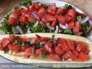 Bruschetta Hummus Stuffed Zucchini