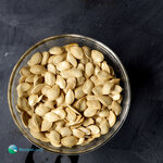 Whole and halved sugar pumpkin