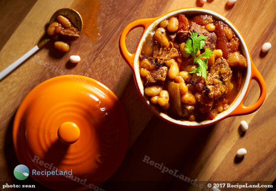 Beef chili with navy beans, one of our many easy chili recipes. Perfect for simmering on the stovetop or use your crock-pot for a slow-cooker chili recipe.