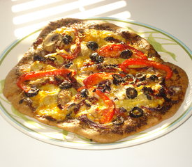 Basil Pesto, Artichoke Hearts, Sun-dried Tomato and Roasted Bell Pepper Pizza