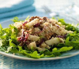 Quinoa and Arugula Salad with Pears, Walnuts, Dried Fruits, and Jack Cheese