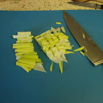 Chop the leeks into long strips (left), then smaller bits (right)